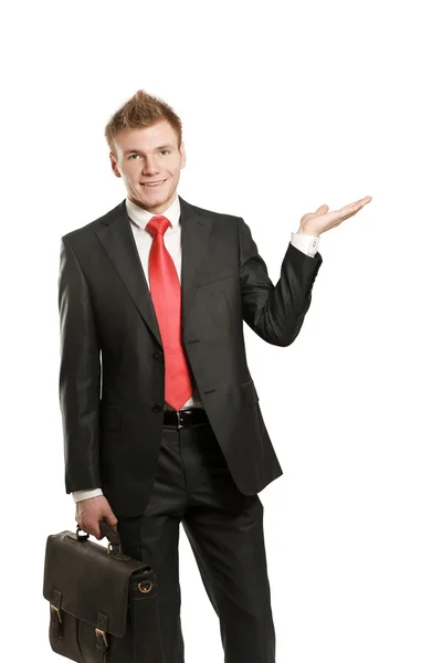 Young man pointing something — Stock Photo, Image