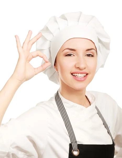 Attractive cook woman showing ok — Stock Photo, Image