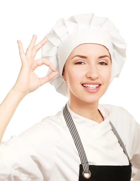 Atraktivní kuchaře žena ukazující ok Royalty Free Stock Obrázky