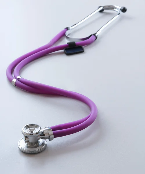 A stethoscope on white, closeup — Stock Photo, Image