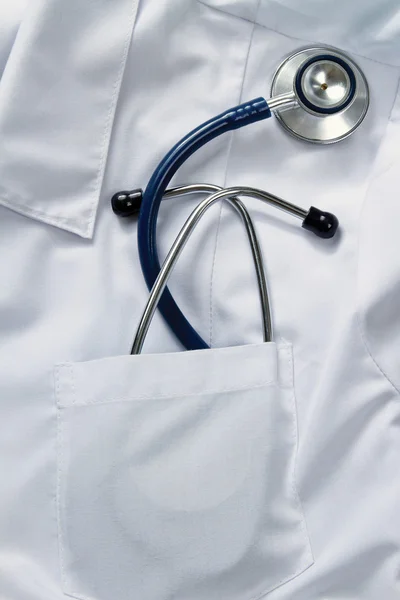 A stethoscope on a medical uniform — Stock Photo, Image