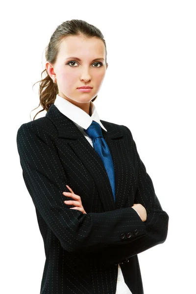 A beautiful woman standing with her arms crossed — Stock Photo, Image