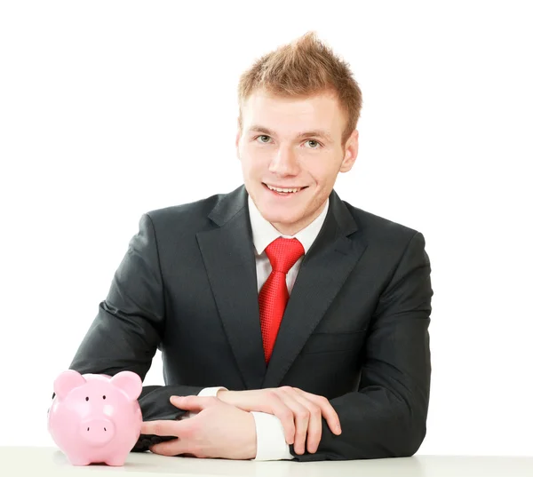 Young man with piggy bank — Stock Photo, Image