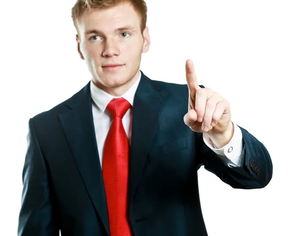 A young man pointing something — Stock Photo, Image