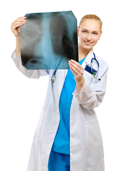 Female doctor examining an x-ray — Stock Photo, Image