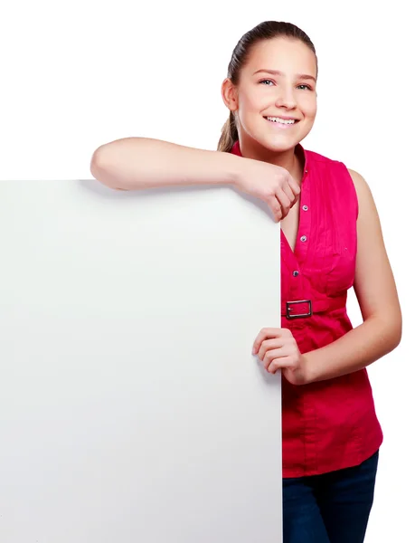 A smiling woman with a blank — Stock Photo, Image