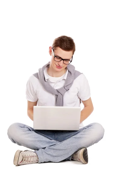 Man working with a laptop on the floor Royalty Free Stock Images