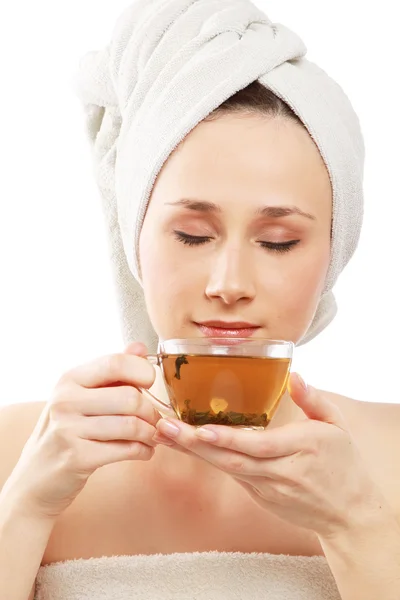 Beautiful young woman enjoying tea — Stock Photo, Image