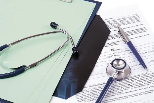 Stethoscope on medical billing statement — Stock Photo, Image