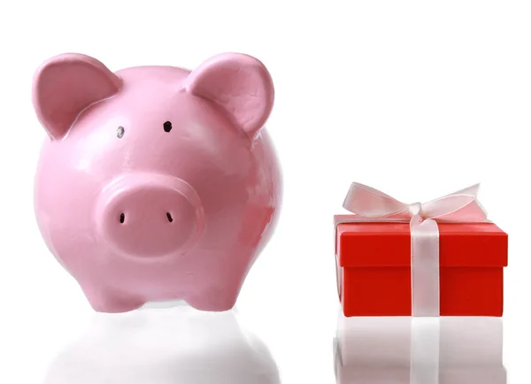 Piggy bank style money box and gift — Stock Photo, Image