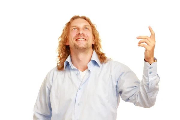 A young man showing something — Stock Photo, Image