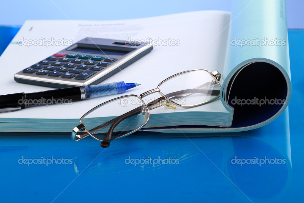Business concept with notebook and calculator