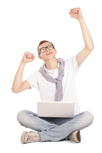 A man working with a laptop on the floor — Stock Photo, Image