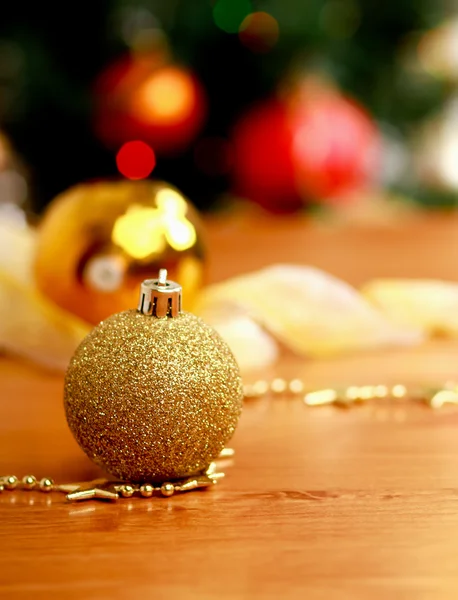 Close up decorative ball on the background of Christmas tree. — Stock Photo, Image