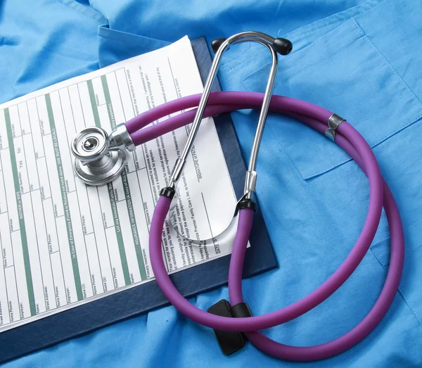 Doctor's stethoscope on the form — Stock Photo, Image