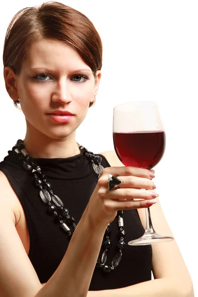 Jeune femme avec un verre à vin près du mur — Photo