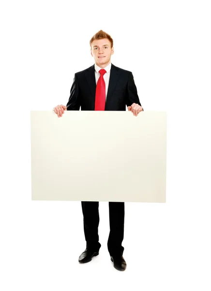 A business man with an empty blank — Stock Photo, Image