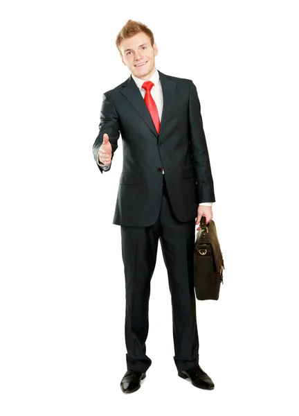 A young businessman giving his hand — Stock Photo, Image