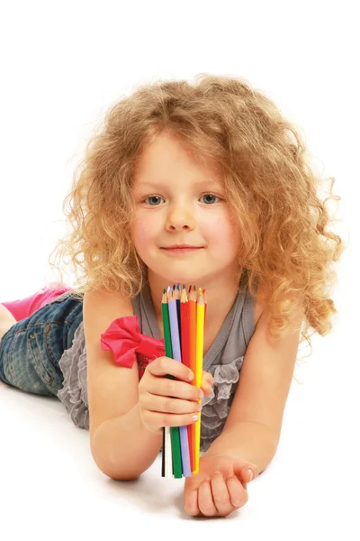 Happy little girl drawing with pencils — Stock Photo, Image