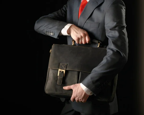 Erfolgreicher Geschäftsmann mit Tasche — Stockfoto