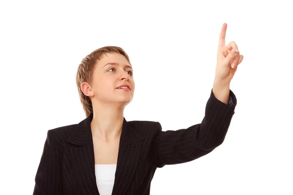 Beautiful businesswoman pointing at something — Stock Photo, Image