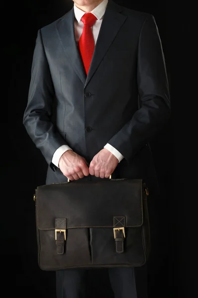 Successful business man with bag — Stock Photo, Image