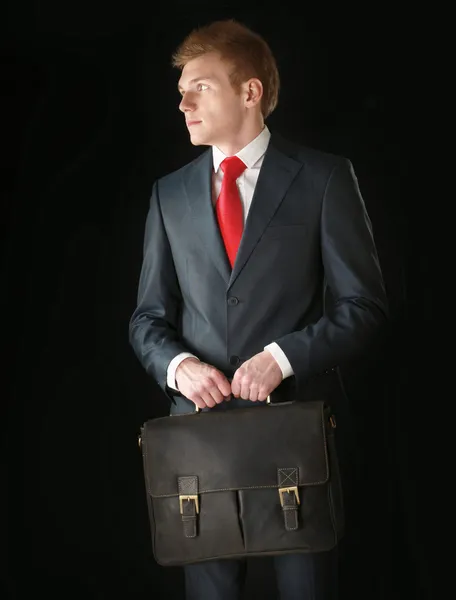 Successful business man with bag — Stock Photo, Image