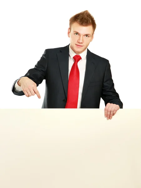 A business man with an empty blank — Stock Photo, Image