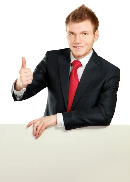 Young businessman with blank — Stock Photo, Image