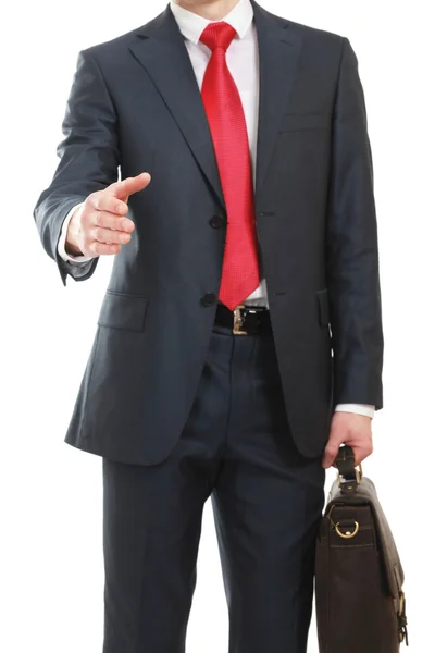 A young businessman giving his hand — Stock Photo, Image