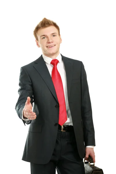 Un joven hombre de negocios dando su mano — Foto de Stock