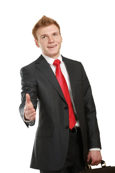 Um jovem homem de negócios dando a mão — Fotografia de Stock