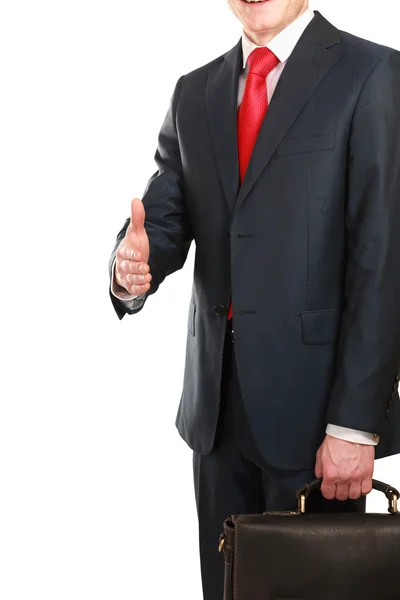 A young businessman giving his hand — Stock Photo, Image