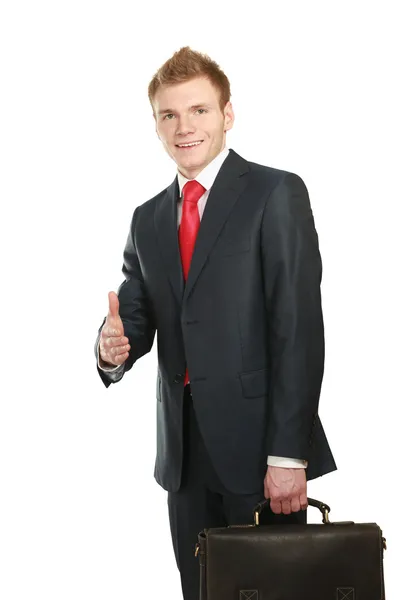 A young businessman giving his hand — Stock Photo, Image