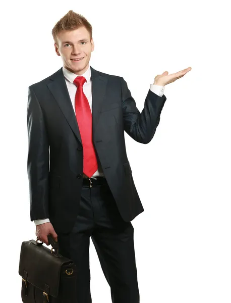 A young man showing something — Stock Photo, Image