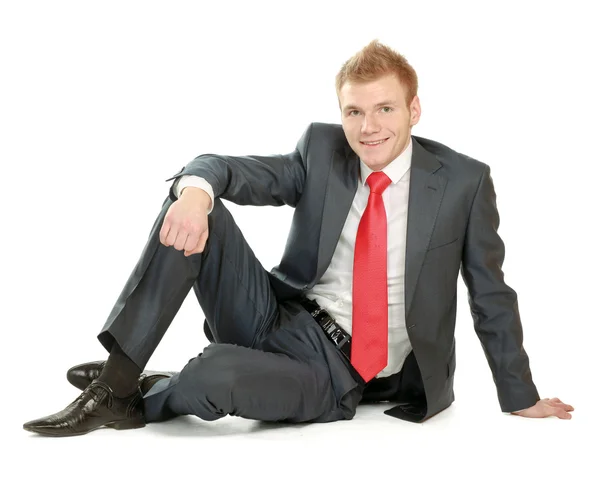 Relaxed mature business man sitting on the floor — Stock Photo, Image