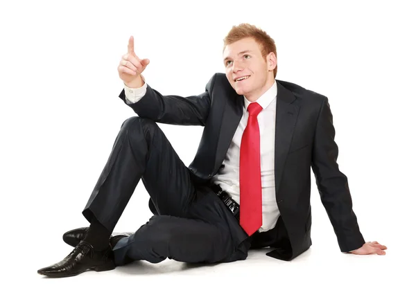 Relaxed mature business man sitting on the floor — Stock Photo, Image