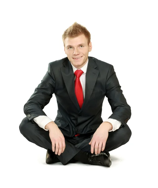 Relaxed mature business man sitting on the floor — Stock Photo, Image