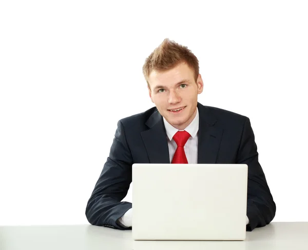 Joven empresario en su lugar de trabajo — Foto de Stock