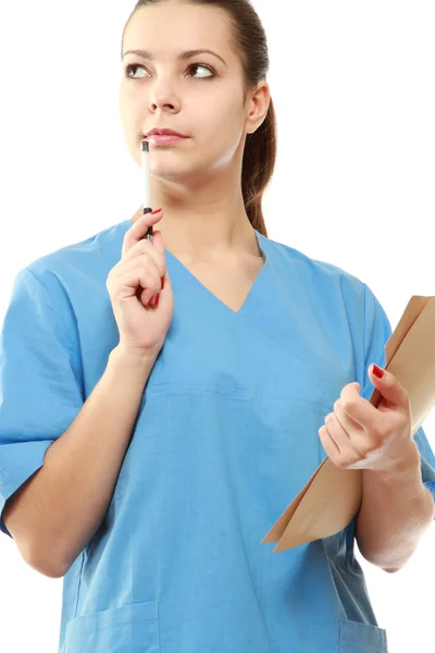 Una dottoressa con una cartella in uniforme — Foto Stock