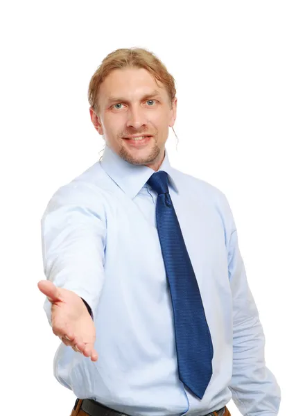 Portrait of a successful businessman giving a hand — Stock Photo, Image