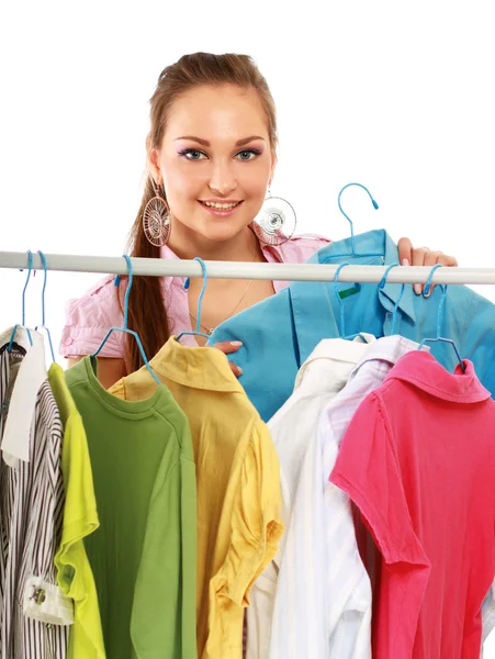 Stylish young girl trying on clothes — Stock Photo, Image