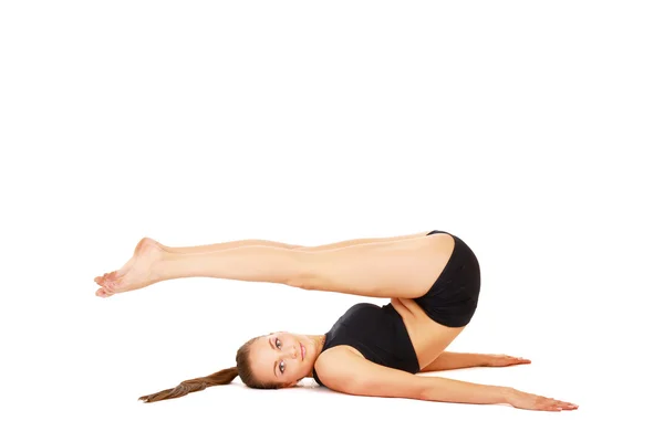 Smiling woman doing stretching excersises — Stock Photo, Image