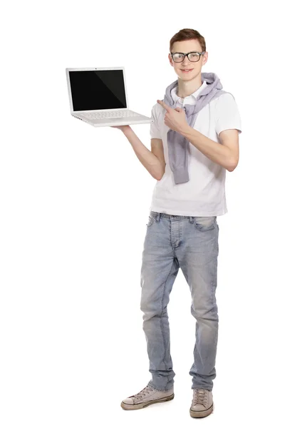 Een jonge man met een laptop — Stockfoto