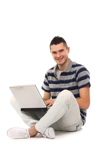 Jovem homem de negócios feliz com laptop — Fotografia de Stock