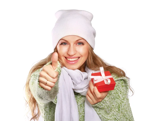 Beautiful woman holding gift — ストック写真