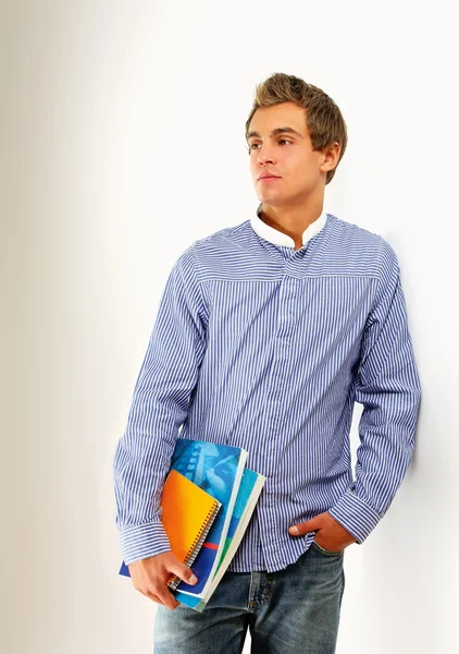 A young college guy with books — Stock Photo, Image