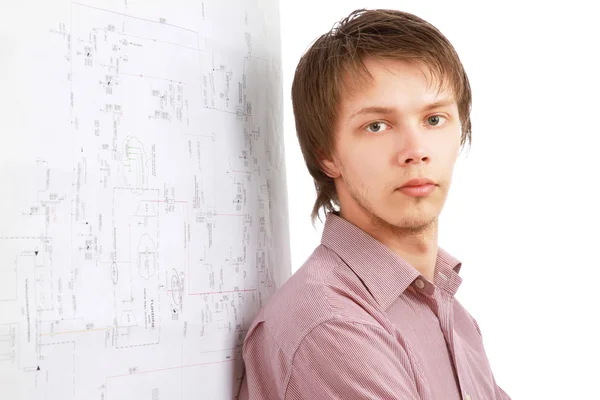 A young man near a diagram — Stock Photo, Image