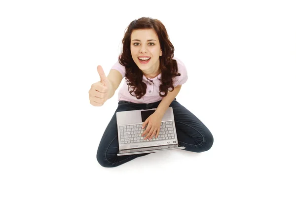 A happy young girl with a laptop — Stock Photo, Image