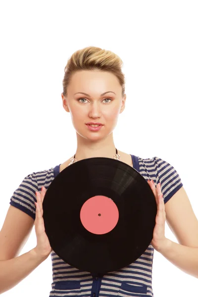 Una giovane donna con un disco in vinile — Foto Stock